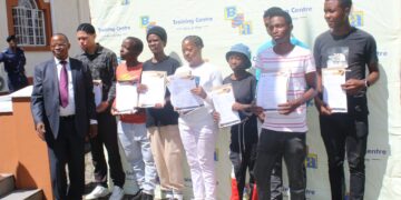 Deputy Prime Minister Thulisile Dladla and BSA Training Centre representatives present scholarship awards to beneficiaries, marking a milestone in supporting vulnerable youth in Eswatini.
