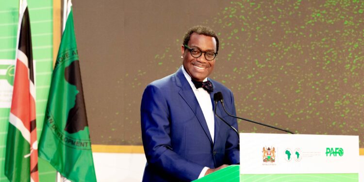 Dr. Akinwumi A. Adesina, President and Chairman of the Board of Directors, African Development Bank Group, stands at the lectern during Scaling SHF Finance Conference: Day 2 Opening Session.
