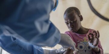 A Mpox patient receiving treatment in the DRC.