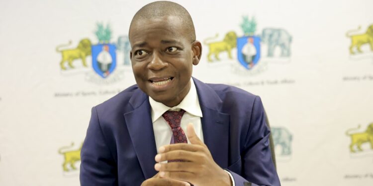 The Honourable Minister of Sports, Culture and Youth Affairs, Muzi Bongani Nzima