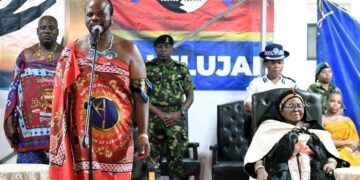 His Majesty King Mswati III addresses attendees at the Buganu ceremony, announcing plans to expand the Hlane Royal Residence arena to accommodate growing crowds.