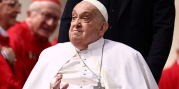 Pope Francis greets cardinals as he unexpectedly appears during the Palm Sunday Mass in Saint Peter's Square at the Vatican, April 13, 2025. Yara Nardi/Reuters