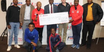 Minister Nzima launches 2025 KFC Eswatini Soccer Tournament, inspiring youth through sports.