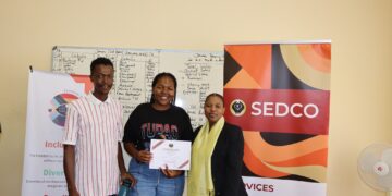 Participants of the ESGM entrepreneurship workshop celebrate the completion of their five-day training at SEDCO Manzini Estate.