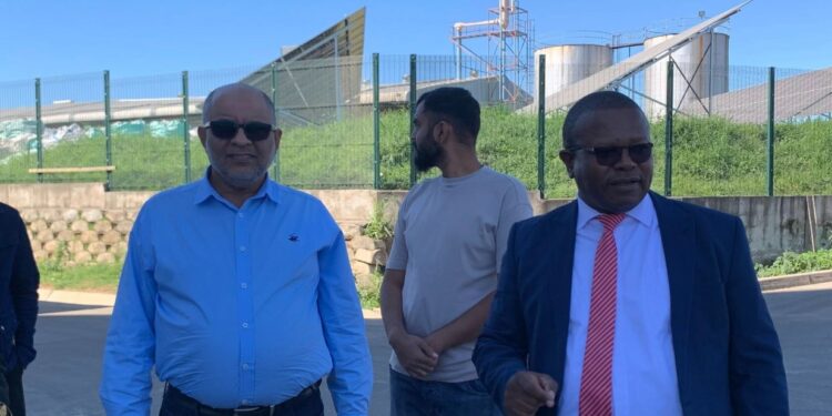 Eswatini Oil Mill Managing Director Mohamed Daud (right) discusses operations with Minister of Commerce, Industry and Trade Manqoba Khumalo during a site tour at the Matsapha facility.