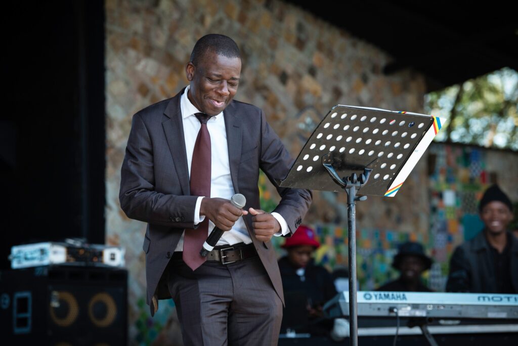 Minister for Sports, Culture and Youth Affairs, Bongani Nzima, addresses attendees at the EU Bushfire Schools Festival held at House on Fire, Malkerns. Malkerns, Eswatini – 20250529 – School’s Festival, Bushfire 2025. Photo: Bram Lammers / MTN Bushfire