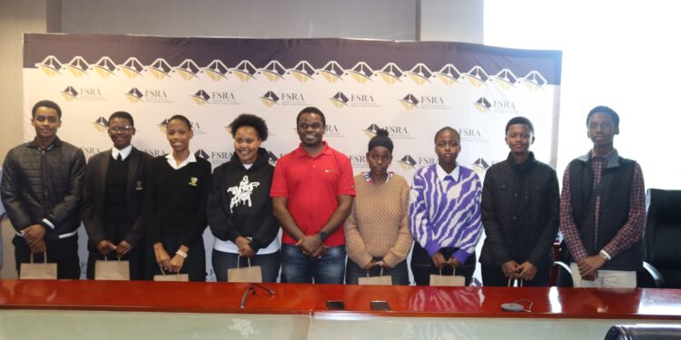 Students from five high schools pose with FSRA staff during the closing ceremony of the two-week job shadowing programme in Mbabane.