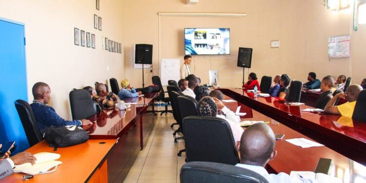 Teachers from over 30 schools engage in group activities during the JA Company of the Year 2025 training workshop in Eswatini.