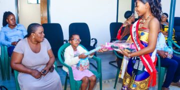 Miss Cultural Heritage Gcinizwi Tsikati celebrates her birthday with children at the Autism Centre in Manzini.