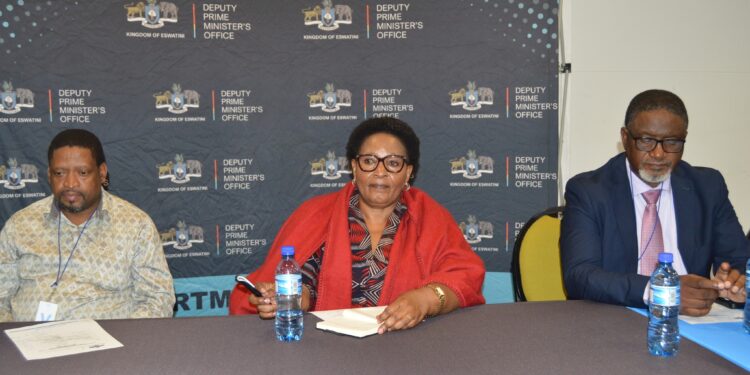 Deputy Prime Minister Thulisile Dladla shares a moment with Members of Parliament during the preview screening of the new family-reunion reality show, Asibambaneni Sibengumndeni, held at her office in Mbabane.