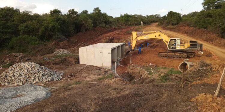 Construction workers at the KaNgaju low-level crossing site as the project reaches 75% completion, set to improve access for communities in Lubombo.