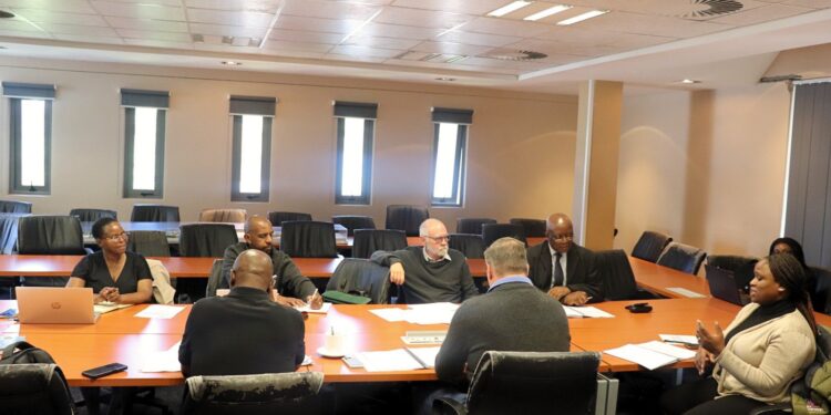 Participants at the Ministry of Housing and Urban Development’s workshop in Mbabane, preparing for the sectional titles examination.