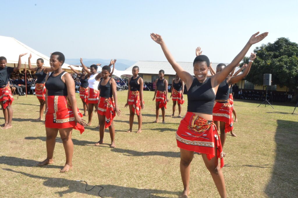 Salem High School students perform lively cultural and musical acts during the new hall opening ceremony.