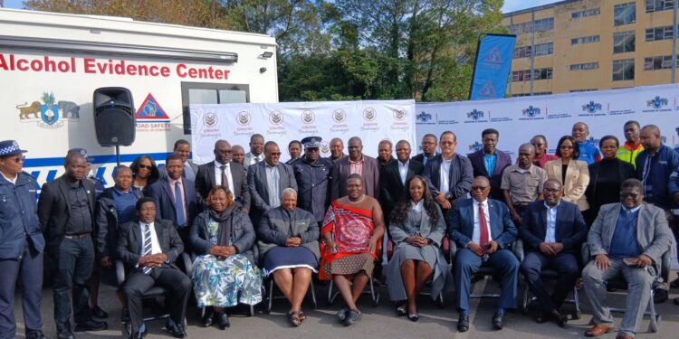 Minister Chief Ndlaluhlaza Ndwandwe receives the new Alcohol Evidence Truck from Eswatini Beverages Country Director, Ms. Doreen Tumureebire, at the Ministry of Public Works and Transport in Mbabane. Photo: Ministry of Public Works and Transport building with the Alcohol Evidence Truck parked outside.
