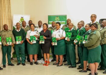 His Majesty’s Correctional Services leadership and staff gather for a group photo following the launch of the Health and Wellness Policy and Strategic Plan 2024–2028 at The George Hotel in Manzini.