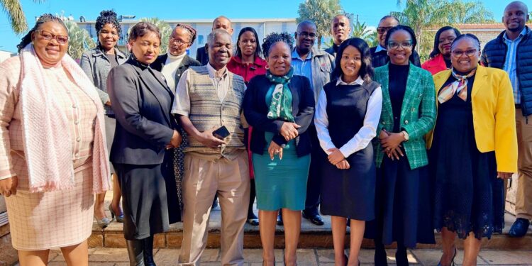 Members of the Financial Inclusion Technical Committee pose for a group photo after the strategy planning session in Mbabane.