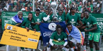 Nsingizini Hotspurs players and technical team celebrate after securing their first-ever MTN Premier League title with a resounding 5-0 win over Sidvwashini United. Photo by MTN Eswatini