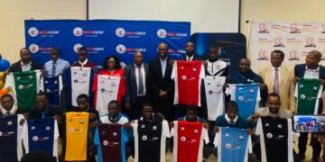 Officials and school representatives pose for a group photo after the Instacash Schools Soccer Tournament Top 16 draw at Sigwaca House in Mbabane.