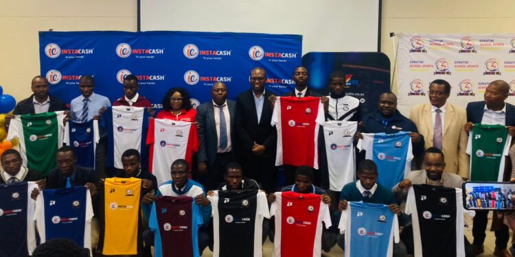 Officials and school representatives pose for a group photo after the Instacash Schools Soccer Tournament Top 16 draw at Sigwaca House in Mbabane.