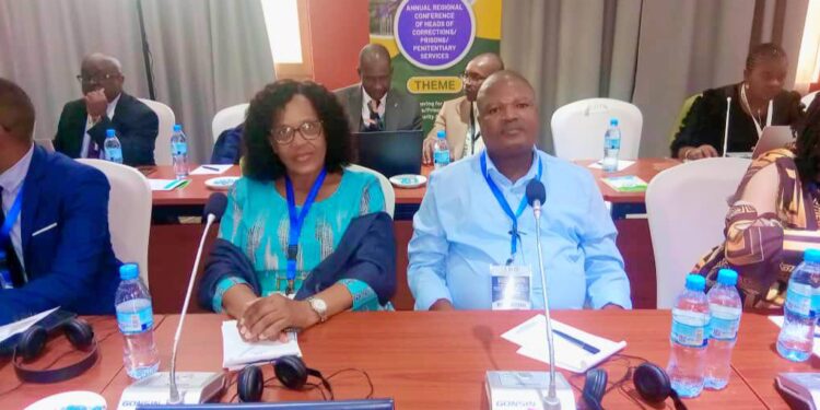 Commissioner General LaMakhosini Phindile Dlamini pictured with fellow heads of correctional services during the SADC Regional Conference in Dar es Salaam, Tanzania. He is accompanied by Chief Officer Sikhumnuzo Dlamini from the Monitoring and Evaluation Department.
