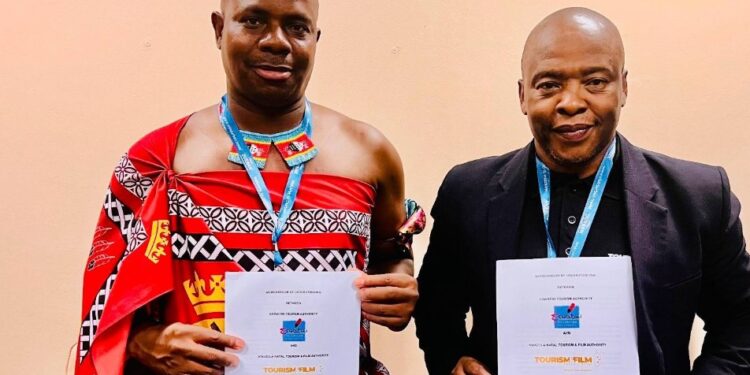 ETA CEO Vusie N. Dlamini and Acting KZN Tourism & Film CEO Dr. Sibusiso Gumbi shake hands after signing a tourism partnership agreement at Africa’s Travel Indaba in Durban.