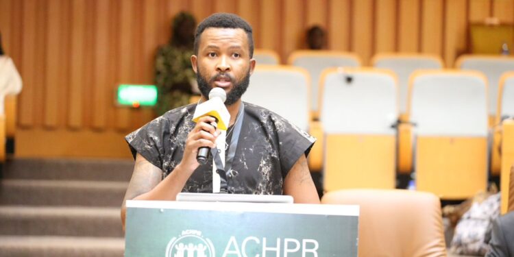 Melusi Simelane representing SALC delivers an address at the 83rd African Commission session in Banjul