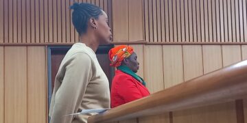 Aunty Lomathemba Dlamini (in red) with her niece Nompumelelo Dlamini (in khakhi top) at the Magistrates Court (Pic: Khulekile Mhlanga).