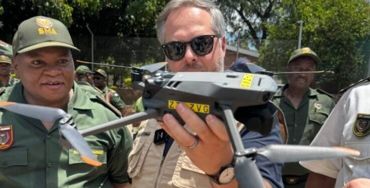 Leon Schreiber, South Africa’s Minister of Home Affairs, displays a drone used in border surveillance operations.