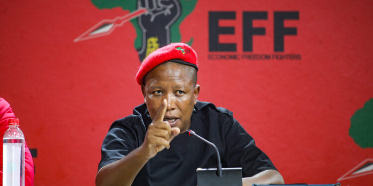 JOHANNESBURG, SOUTH AFRICA - NOVEMBER 25: CIC Julius Malema addresses the media at Winnie Madikizela Mandela House on November 25, 2021in Johannesburg, South Africa. This follows the Inaugural Council Meetings held across the country. (Photo by Gallo Images/Sharon Seretlo)