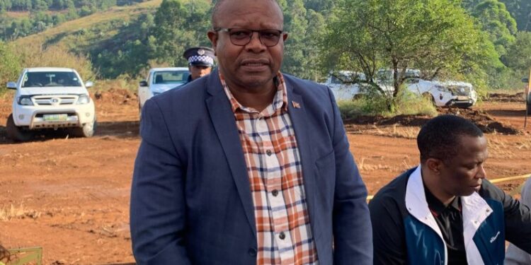 Minister of Commerce, Industry and Trade Manqoba Khumalo breaks ground at the Piggs Peak factory site, marking the start of a E135 million textile project expected to create over 1,000 jobs.