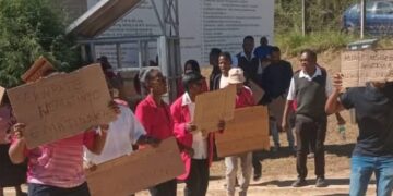 Staff at Mankayane Government Hospital hold up banners during a picket over drug shortages and lack of medical supplies, joining other facilities in protest during Nurses Week.