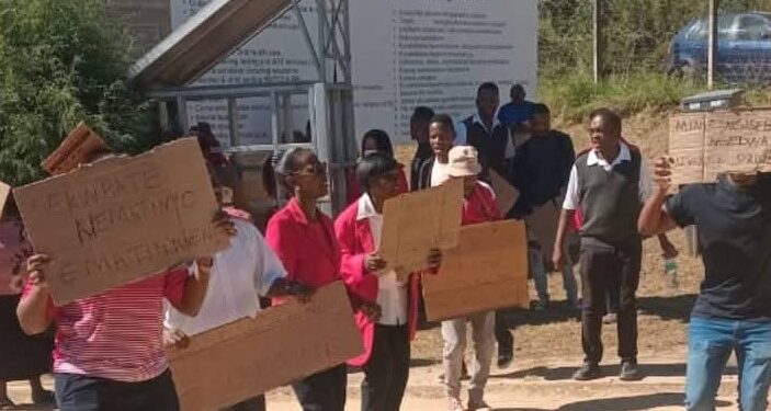 Staff at Mankayane Government Hospital hold up banners during a picket over drug shortages and lack of medical supplies, joining other facilities in protest during Nurses Week.