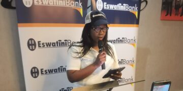 Eswatini Bank Managing Director Noziziwe Mulela speaks with delegates and editors