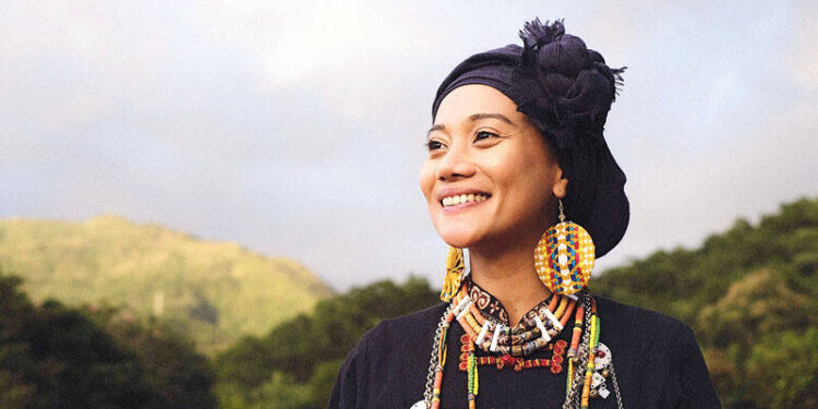 Indigenous singer Abao in traditional Paiwan clothing is pictured in an undated photograph provided for the Sunshine Island Vibe Festival in Kaohsiung in February. Photo courtesy of the Kaohsiung City Government