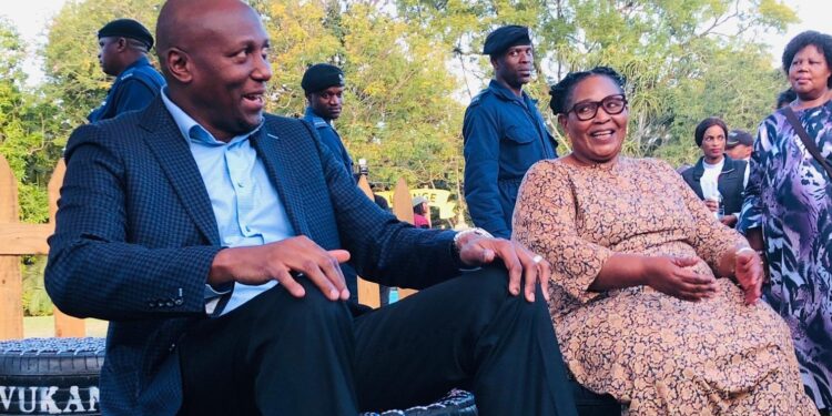 Prime Minister Russell Mmiso Dlamini and Deputy Prime Minister Thulisile Dladla share a light moment while touring stalls during the opening night of the 2025 MTN Bushfire Festival at House On Fire in Malkerns.