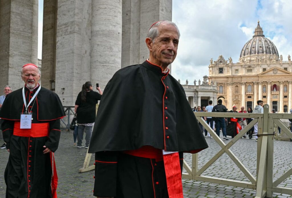 Cardinals Mario Aurelio Poli ((front) and Vicente Bokalic Iglic leave after a congregation meeting on Monday. Photograph: Andreas Solaro/AFP/Getty Images