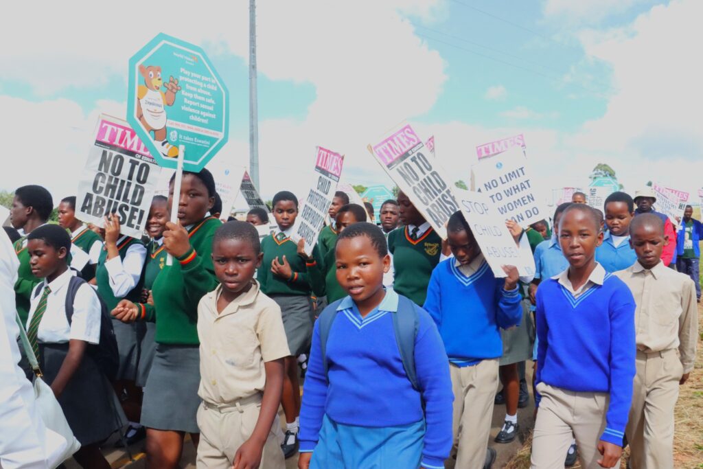 Stakeholders from World Vision, the Deputy Prime Minister's Office, and other partners march through Nhlangano on April 10, 2025, to raise awareness and demand zero tolerance for gender-based violence and violence against children in Eswatini.
