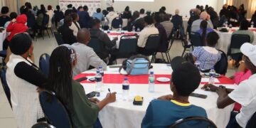 Young people gather during a community event