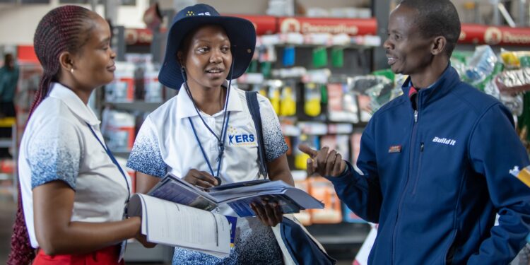 Eswatini Revenue Service (ERS) officials attends to a small business owner during the Bafundzise tax education campaign