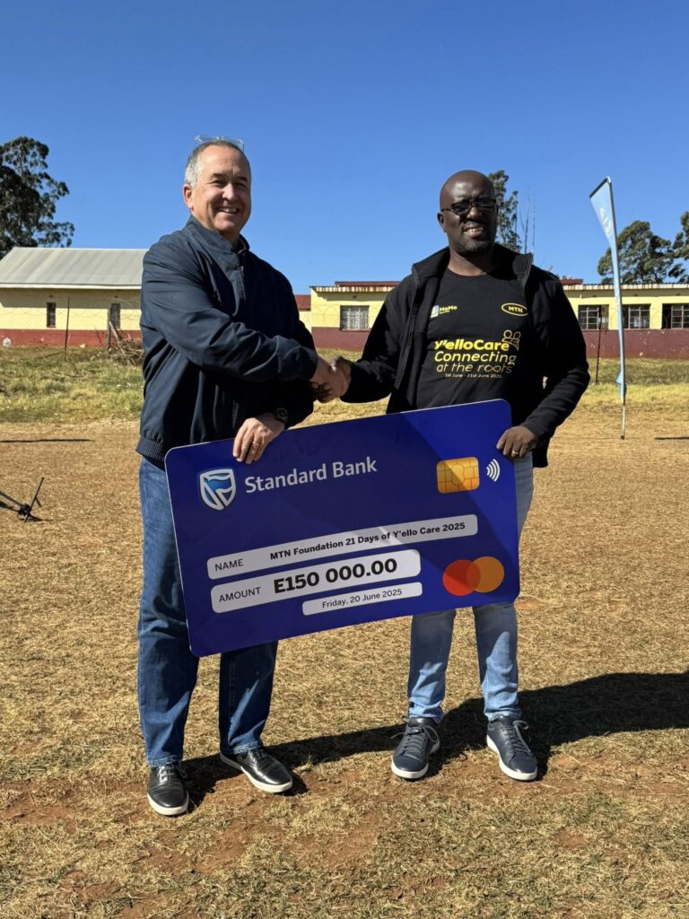 Standard Bank Eswatini CEO presents a E150,000 cheque to the MTN Eswatini CEO in support of the borehole project.