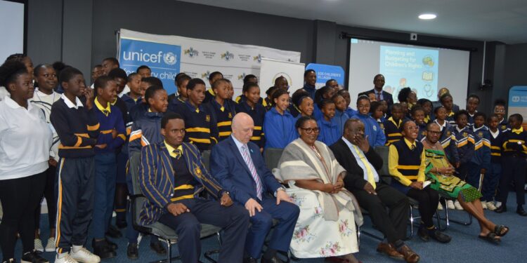 Government officials and partners gather for a group photo at the official launch of Children’s Month in Mbabane.