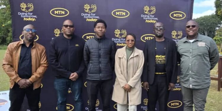 Wandile Mtshali, MTN Eswatini CEO, and Melusi Zox Dlamini of A Peculiar People, pictured with other attendees at the event.