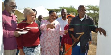 Marking the moment: Acting Prime Minister Thulisile Dladla cuts the ribbon during the official handover ceremony in Lubombo.