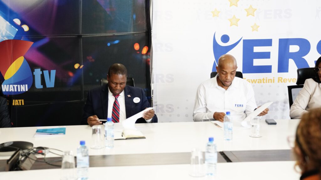 ERS Commissioner General Brightwell Nkambule and ESTVA officials during the signing of the MoU to digitise TV import permits at the ERS Headquarters in Mbabane.