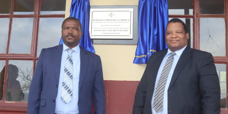Minister of Tinkhundla Administration and Development S'khumbuzo Dlamini at Ngudzeni lnkhundla during the ongoing handover of projects funded through RDF.