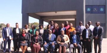 Eswatini delegates pictured with their Zambian counterparts and other regional representatives during a benchmarking visit at the Zambia National Public Health Institute in Lusaka.