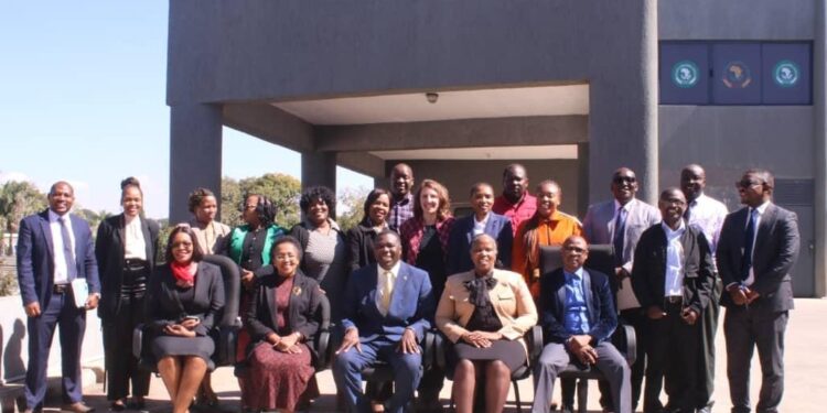 Eswatini delegates pictured with their Zambian counterparts and other regional representatives during a benchmarking visit at the Zambia National Public Health Institute in Lusaka.