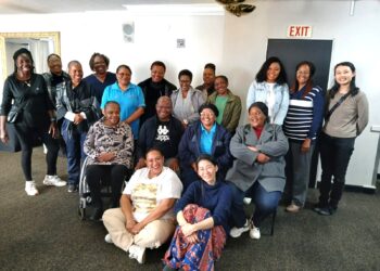 Participants and organisers taking a break in-between class.