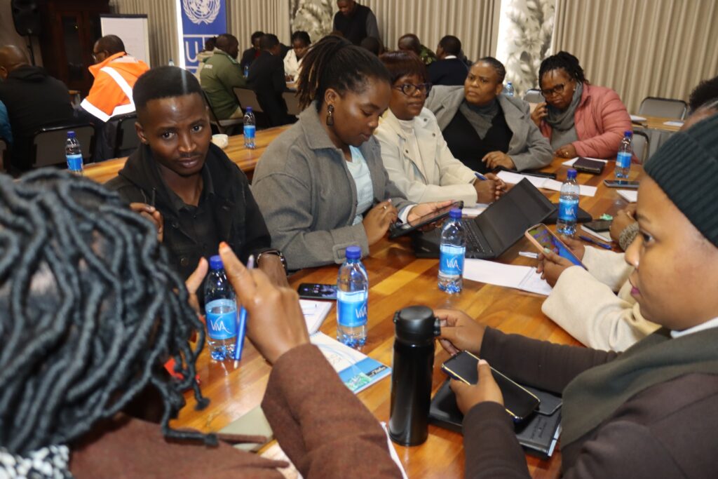 Stakeholders from government, forestry companies, and local communities engage during the fire preparedness meeting held at Phumula Guest House in Nhlangano.