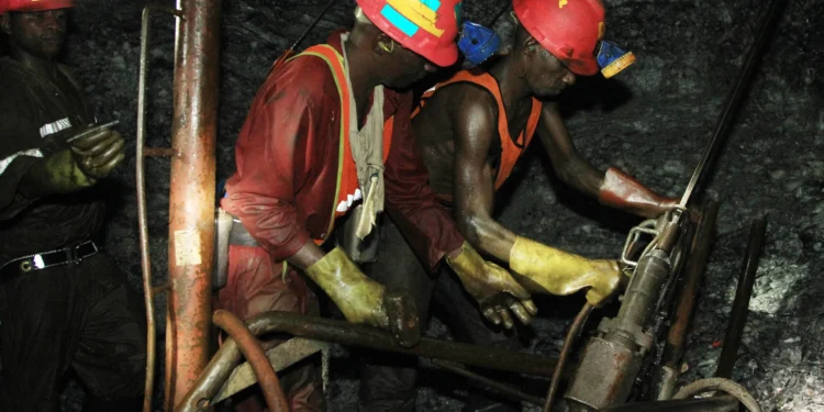 Miners working underground